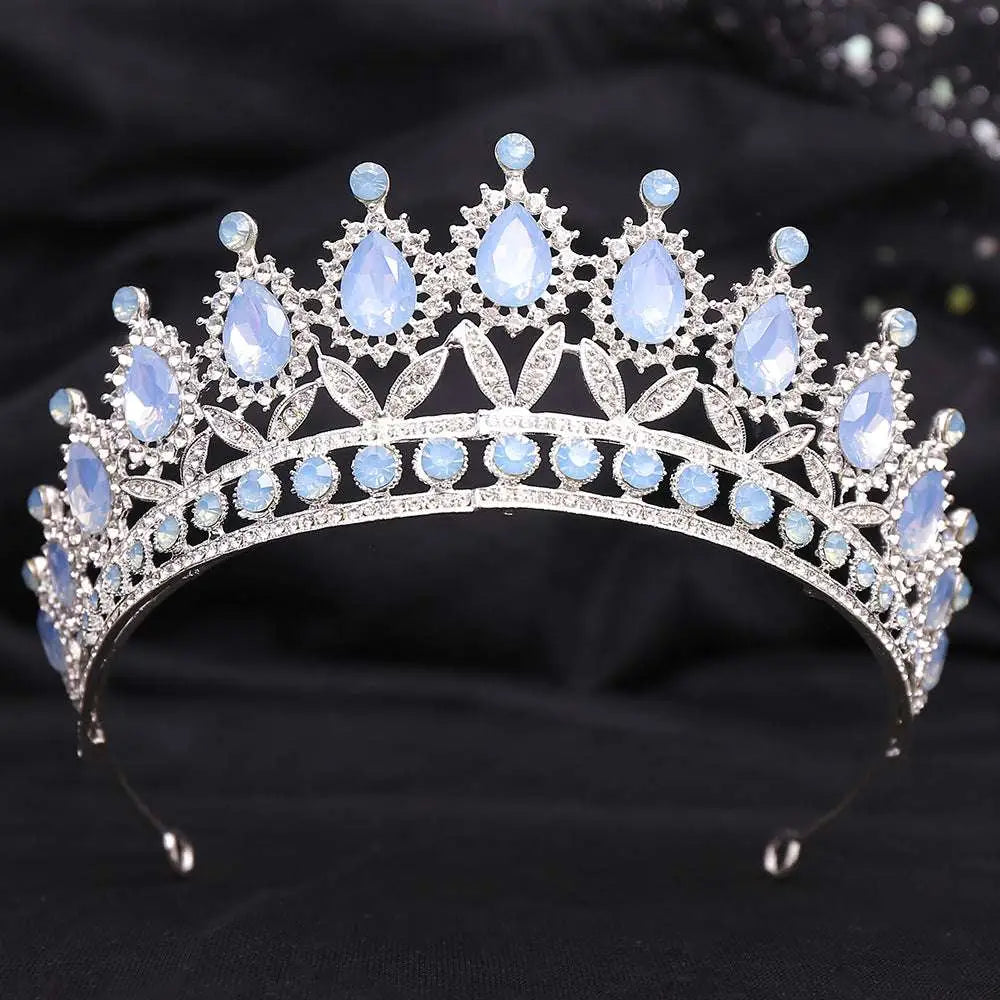 Silver white leafy opal crystal bridal crown featuring light blue teardrop crystals and elegant leaf motif design
