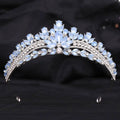Silver white leafy opal and crystal bridal crown featuring a delicate silver tiara with light blue and clear rhinestones