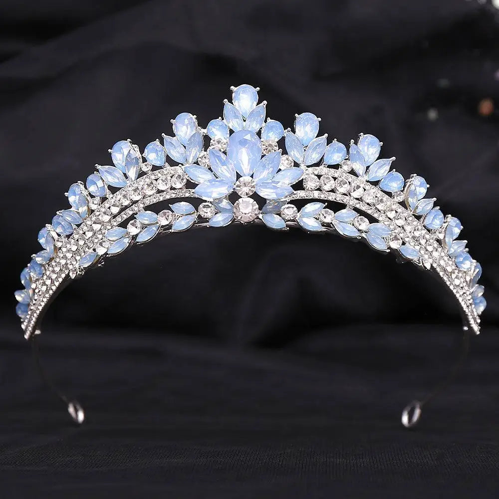 Silver white leafy opal and crystal bridal crown featuring a delicate silver tiara with light blue and clear rhinestones