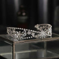 Silver zircon bridal crown headdress featuring a delicate metal framework with floral crystals and a radiant star motif