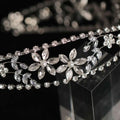 Silver zircon bridal crown headdress with delicate metal framework featuring floral crystals and pearl centers