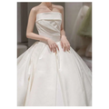 Simple elegant french style strapless ivory satin wedding dress with structured bodice and voluminous skirt