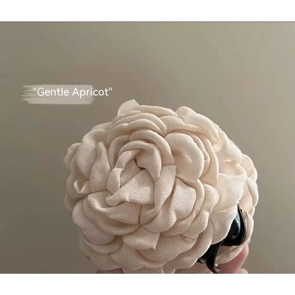 Simple graceful barrettes featuring cream fabric rose hair with layered ruffled petals for elegant styling