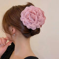 Simple graceful barrettes featuring a delicate pink fabric rose hair clip with layered ruffled petals and soft texture