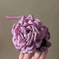Simple graceful barrette with smoky purple fabric rose hair clip featuring layered ruffled petals and a sleek clasp