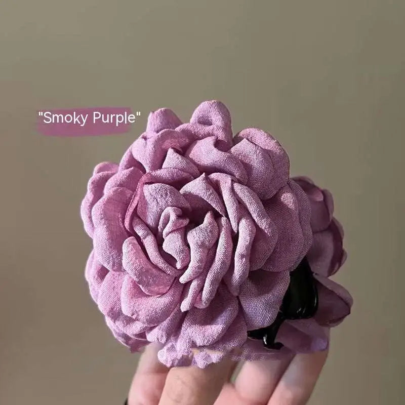 Simple graceful barrette with smoky purple fabric rose hair clip featuring layered ruffled petals and a sleek clasp
