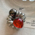 Simple graceful red love phone line hair ring featuring a shiny metallic spider claw with a red heart centerpiece
