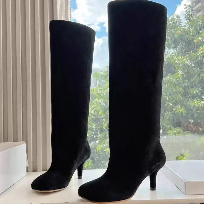 Black knee high boots with simple stitching square head design made of black suede and slender heels