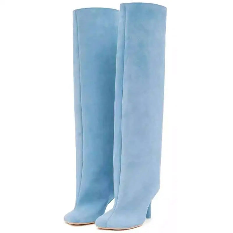Light blue suede over the knee boots with simple stitching square design and modest heel, contrasting black knee high style