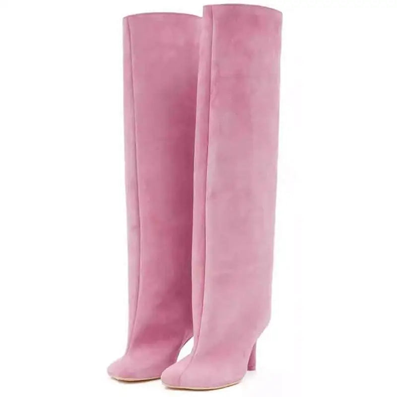 Pair of soft pink suede over-the-knee boots with simple stitching square design and yards custom craftsmanship