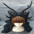 Black simulation horn lace dark witch headband with floral embellishments and central ornate pendant