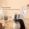 White and silver fully automatic single serve portable coffee machine made of stainless steel with sleek modern design