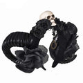 Black horn headband with artificial black roses and a central skull featuring skeleton head sheep design and black sheer mesh