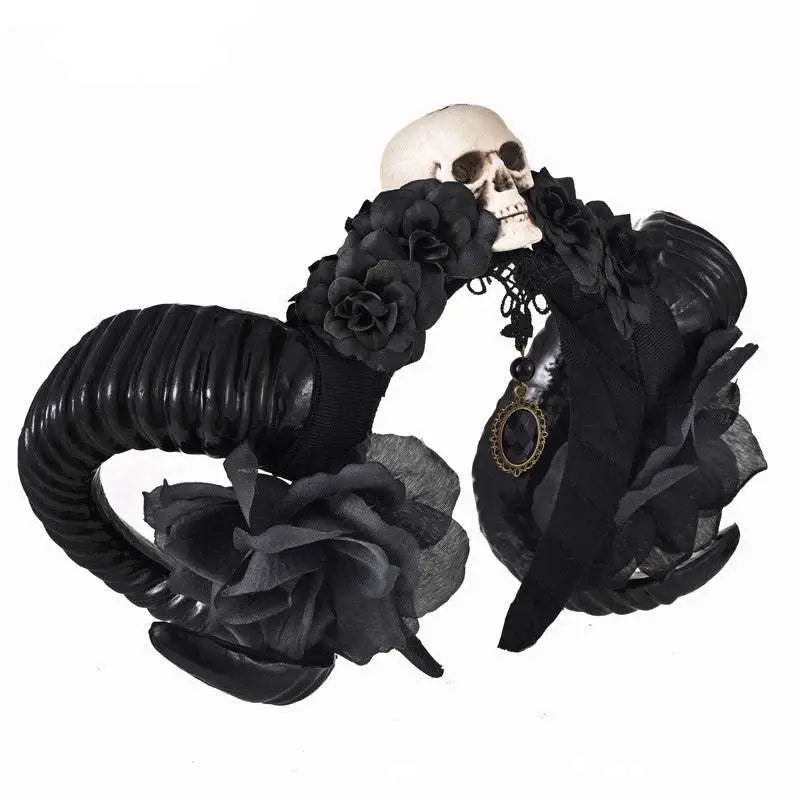 Black horn headband with artificial black roses and a central skull featuring skeleton head sheep design and black sheer mesh