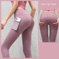 Slate blue high-waisted gym sport seamless leggings with smooth fabric and pocket holding a smartphone