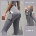 Slate blue gym sport seamless leggings high waisted with built in side pocket holding a smartphone