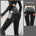 Black sport seamless leggings with built-in side pocket holding smartphone high-waisted gym sport design