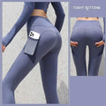 Slate blue gym sport seamless leggings with high-waisted fit and pocket holding a smartphone securely