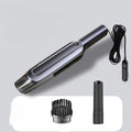 Sleek gray and black cordless handheld vacuum with detachable brush and crevice tool for portable vacuum cleaning