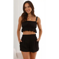 Black ruffled crop top with thin straps and frayed hem paired in sleeveless suspender shorts two-piece set pack of 5