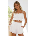 White ruffled crop top with thin straps and gathered frayed hemline from sleeveless suspender shorts two-piece set pack of 5