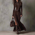 A slim zipper dress in elegant temperament brown suede featuring a high neckline and front zipper detail