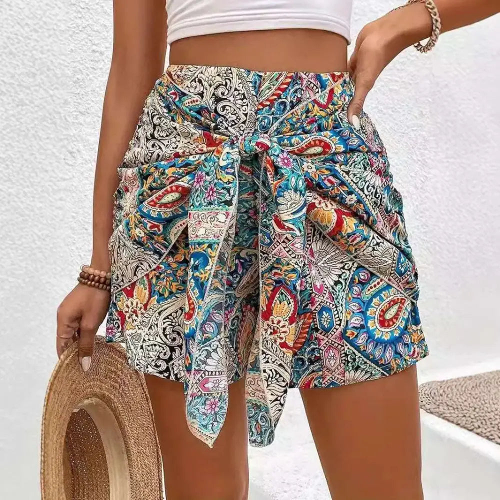 Colorful paisley-patterned slimming lace printed irregular skirt in blue red and cream with lace-up detail