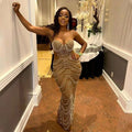A shimmering gold mermaid gown with intricate pearl detailing and sling hot drilling geometric beaded design