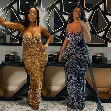 Two women wear sling hot drilling geometric beaded evening dresses in shimmering gold and deep navy blue with crystals