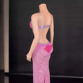 A sparkling pink sling super shiny beaded evening gown with silver beading and a fitted form-fitting design