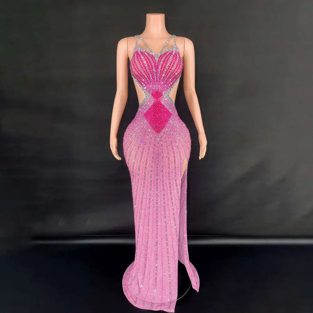 A pink and silver beaded evening gown with a fitted silhouette heart-shaped neckline and high slit from sling super shiny