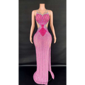 A shimmering pink sling super shiny beaded evening gown with silver diamond beading and a high slit