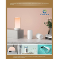 A sleek white feet tower heater with a warm orange glow and digital display designed as a small air conditioner