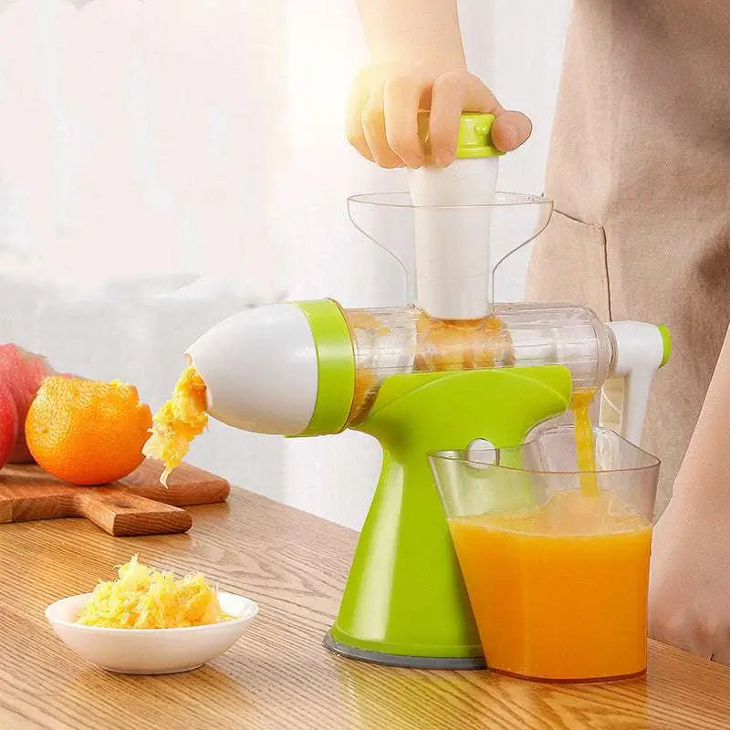 Bright green and white small household juicer with a clear collection container designed for lemon orange juice