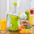 Small household juicer in bright lime green and white with clear plastic chute and collection container designed for lemon orange juice