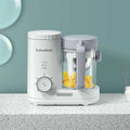 White and gray boboduck small multifunctional complementary food machine with transparent jar filled with yellow fruit pieces