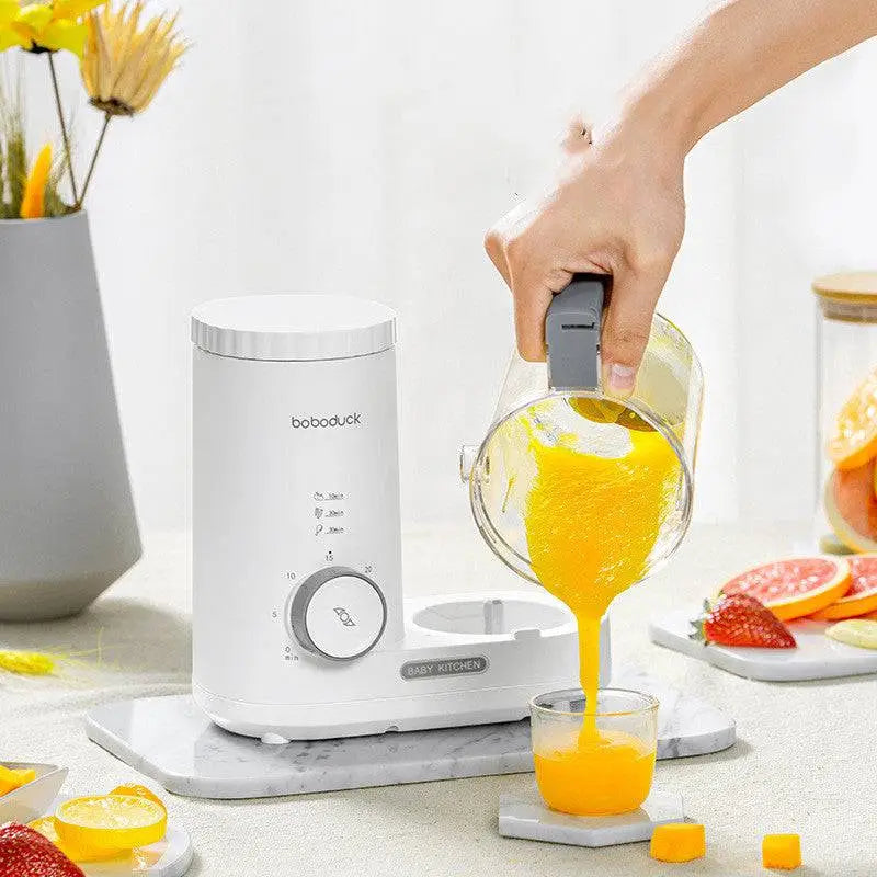 White boboduck baby kitchen small multifunctional complementary food machine with gray handle pouring orange puree