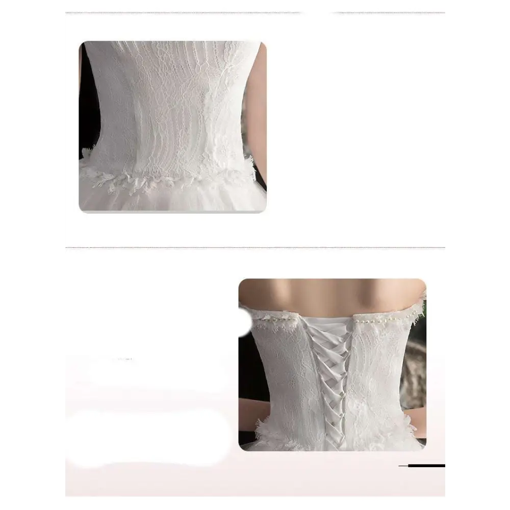 White small trailing wedding dress back with corset style and delicate beaded detailing layered tulle skirt
