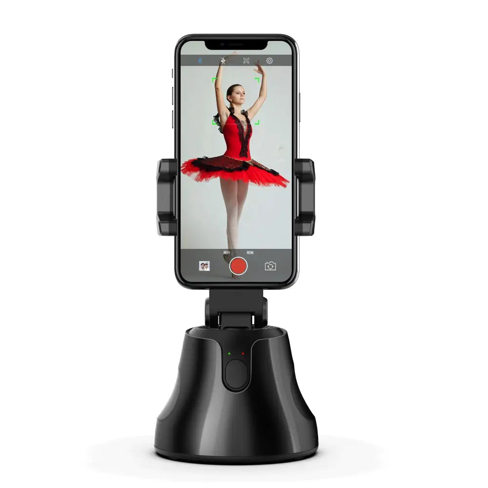 Black smart ai gimbal stabilizer holding phone with live video tracking showing ballerina via apai genie app