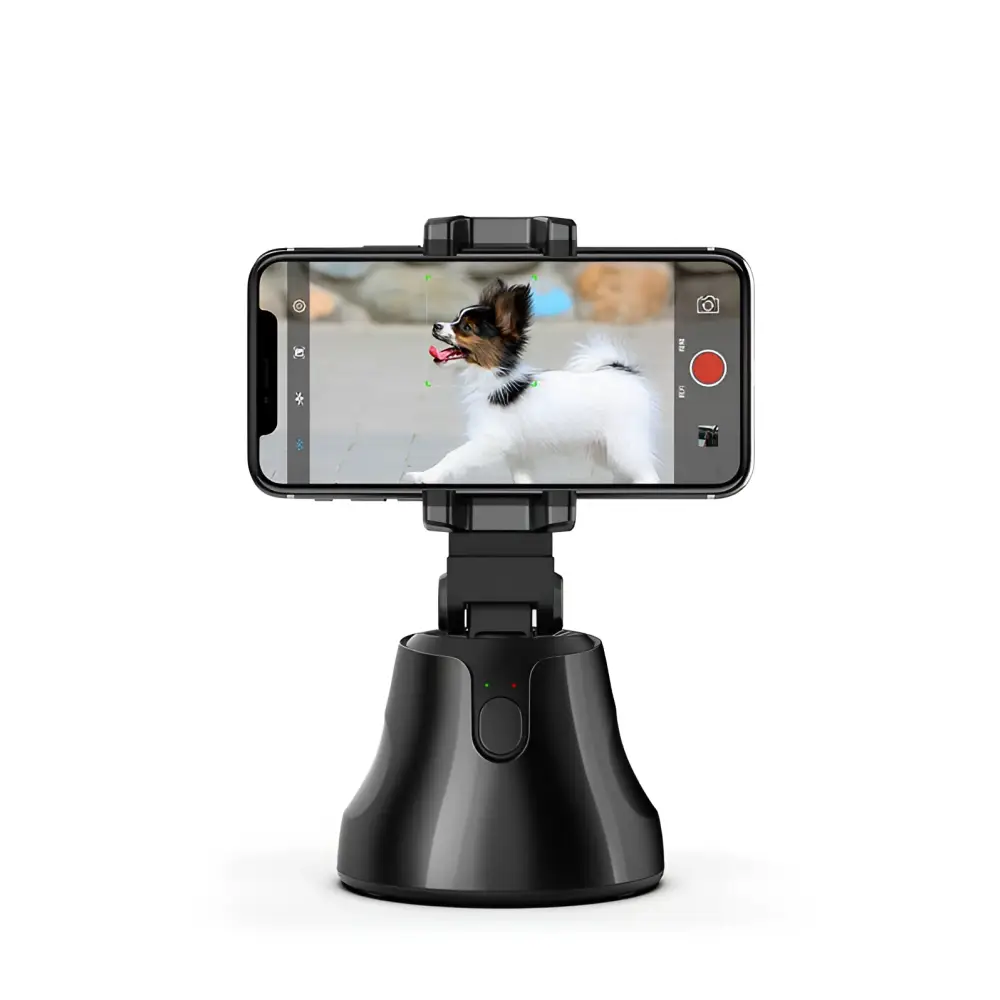 Black smart ai gimbal stabilizer holding phone with live video tracking showing ballerina via apai genie app