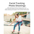 Smart ai gimbal for mobile phone live video tracking with a white t-shirt and red black plaid shirt tied around waist