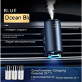 Black cylindrical smart car aroma diffuser with blue led mist lighting and active misting function for vehicle use