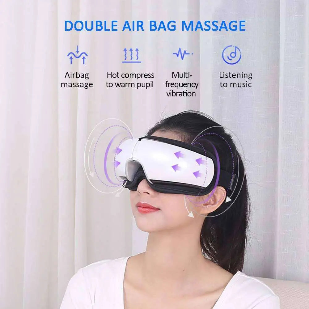 White and black smart eye massager with double air bag technology and purple lighting for soothing relief
