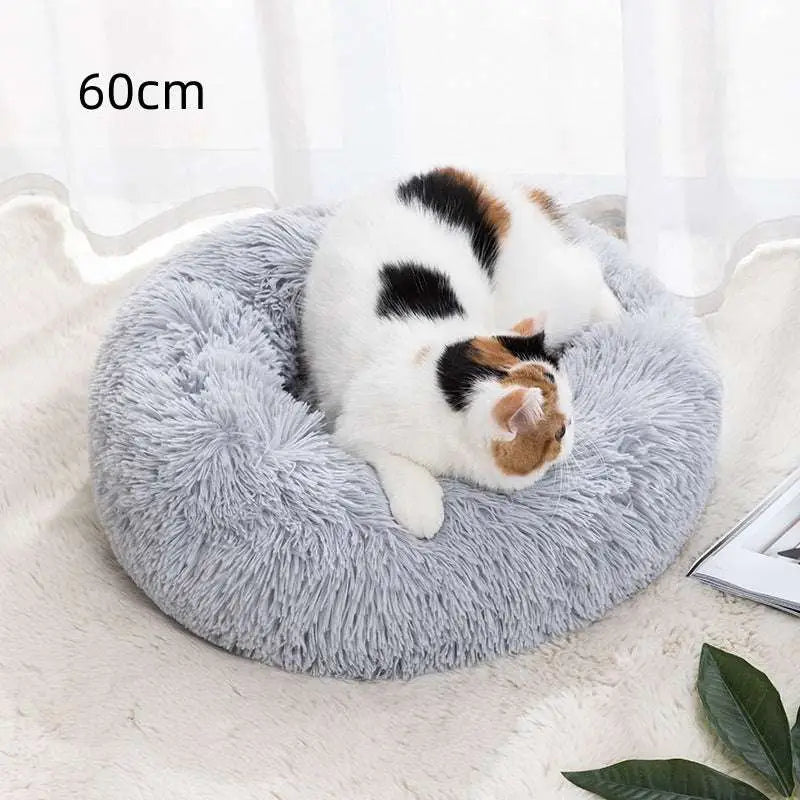 A cozy gray circular warm pet bed with soft fluffy texture and plush winter warm material 60cm diameter