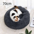 A cozy gray circular warm pet bed with plush winter warm material and soft fluffy texture for pets