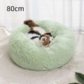 Soft plush winter warm pet bed in soft mint green with a plush fluffy texture and cozy cushioned design