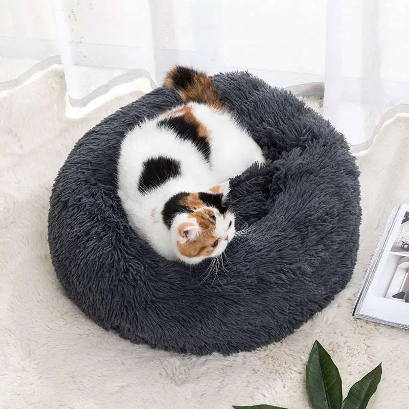 A plush winter warm pet bed in dark gray with a soft fluffy texture designed for cozy comfort
