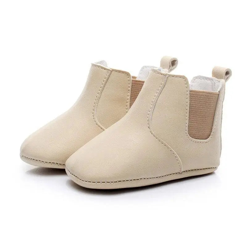 Beige soft suede baby shoes toddler booties with elastic side panels and soft lining for comfortable wear