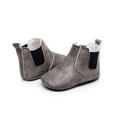 Gray suede baby xie toddler booties with black elastic panels and white trim soft suede baby shoes