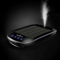 Solar car air purifier with black health life solar-powered humidifier, sleek rectangular design, and blue-lit green LED indicators